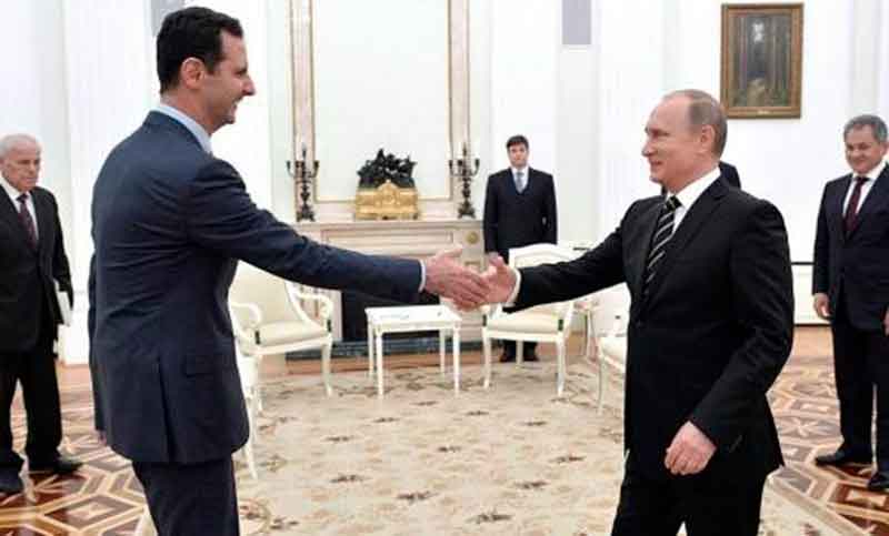 Putin llegó sorpresivamente a Siria y ordenó la retirada de tropas rusas