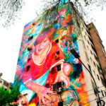 Un barrio de fiesta: inauguraron un nuevo mural de Messi frente al club de su infancia